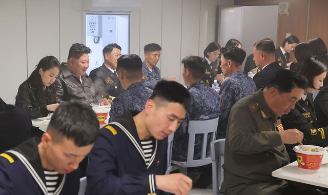North Korea's Kim Jong Un and daughter eat with crew on new warship Choe Hyon