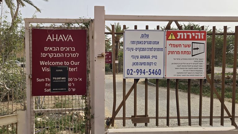 Go to Ein Gedi, where there is free parking and coffee, a sign says. Another says the site is temporarily closed, drive 12 minutes Pic: AFSC