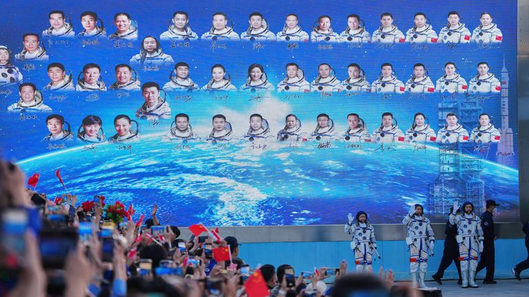 China launches three-astronaut rocket into space as new lunar race ...