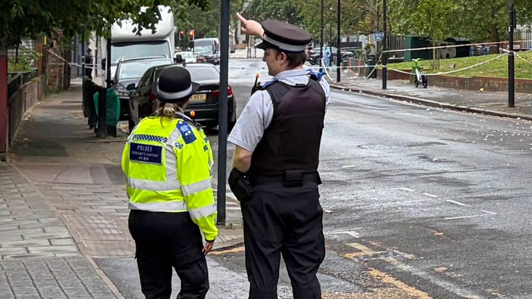 Officers near the scene. Pic: PA