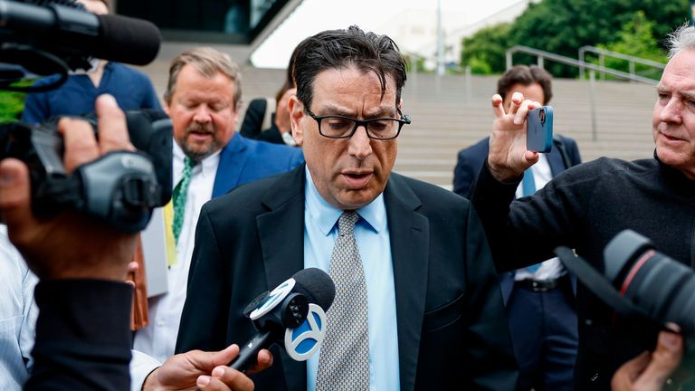 Erik Fleming departs a federal court in Los Angeles after being sentenced. Pic: AP