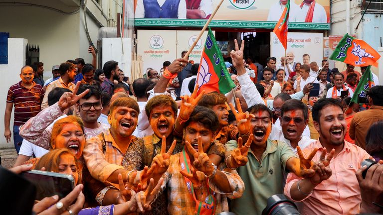 India’s ruling Bharatiya Janata Party (BJP) supporters celebrate. Pic: Reuters