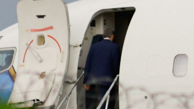 John Ratcliffe seen boarding a US government plane. Pic: Reuters