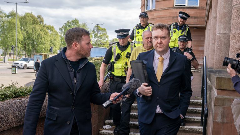 Sky News' Scotland correspondent Connor Gillies questioning Linden outside Falkirk Sheriff Court on Tuesday. Pic: PA