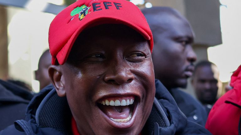 Julius Malema reacts as he leaves South Africa's constitutional court. Pic: Reuters
