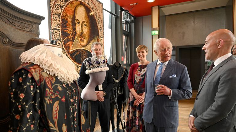 King Charles speaks with co-artistic director Daniel Evans (right). Pic: PA