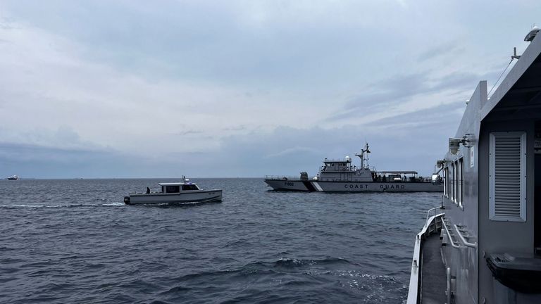 Coast guard boat and other vessels deployed in search near Alimathaa Island, Vaavu Atoll, Maldives, on Saturday. Pic: AP
