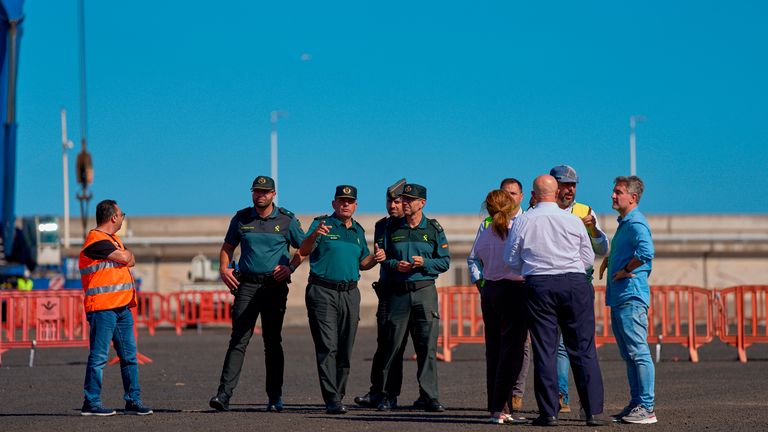 Authorities inspect the disembarkment point for MV Hondius passengers. Pic: AP