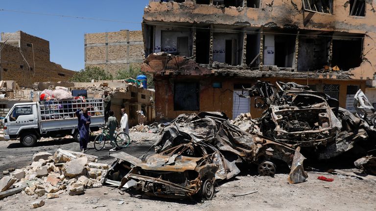 Residents next to a blast site in Quetta, Pakistan, in May. Pic: Reuters