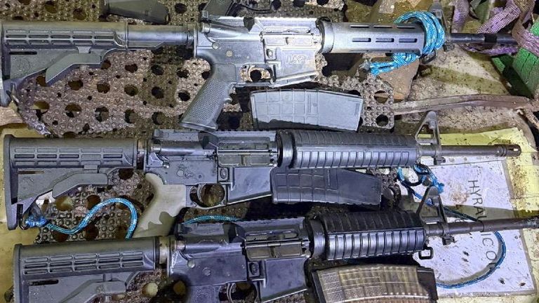 Guns and ammunition were also found on board. Pic: Guardia Civil/Reuters