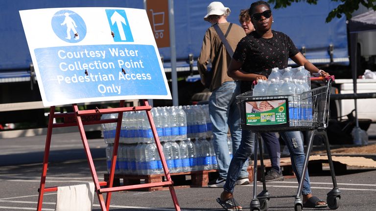 Bottled water is being handed out in several locations. Pic: PA