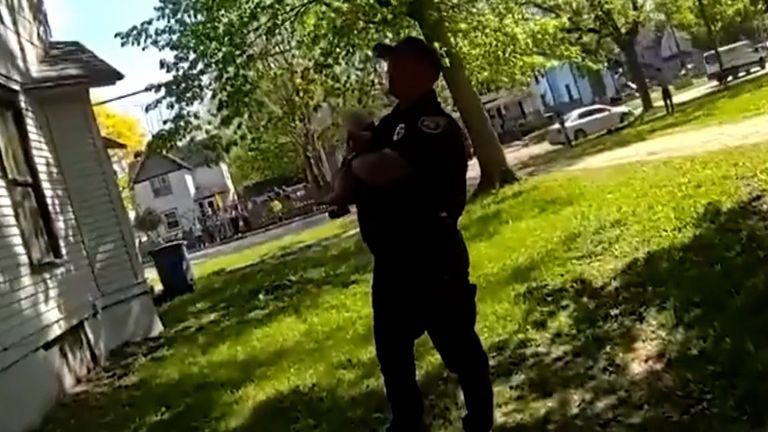 Police officer catches baby thrown from burning home | US News | Sky News