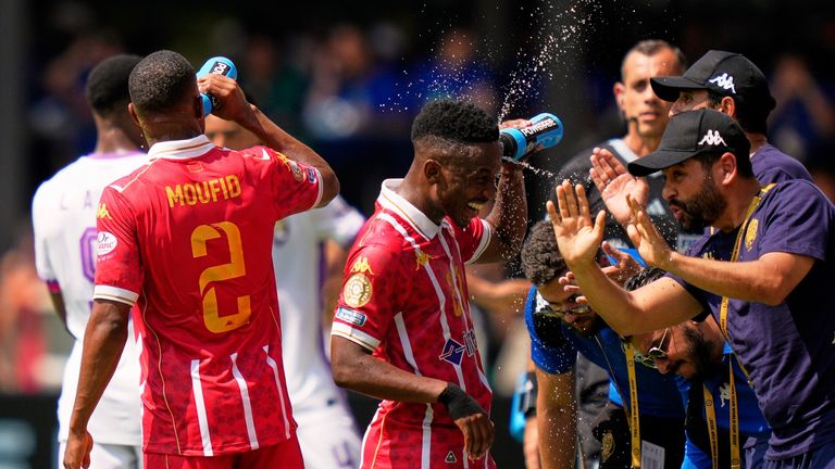 Wydad AC players drink and splash water on themselves during the Club World Cup in Washington. Pic: AP