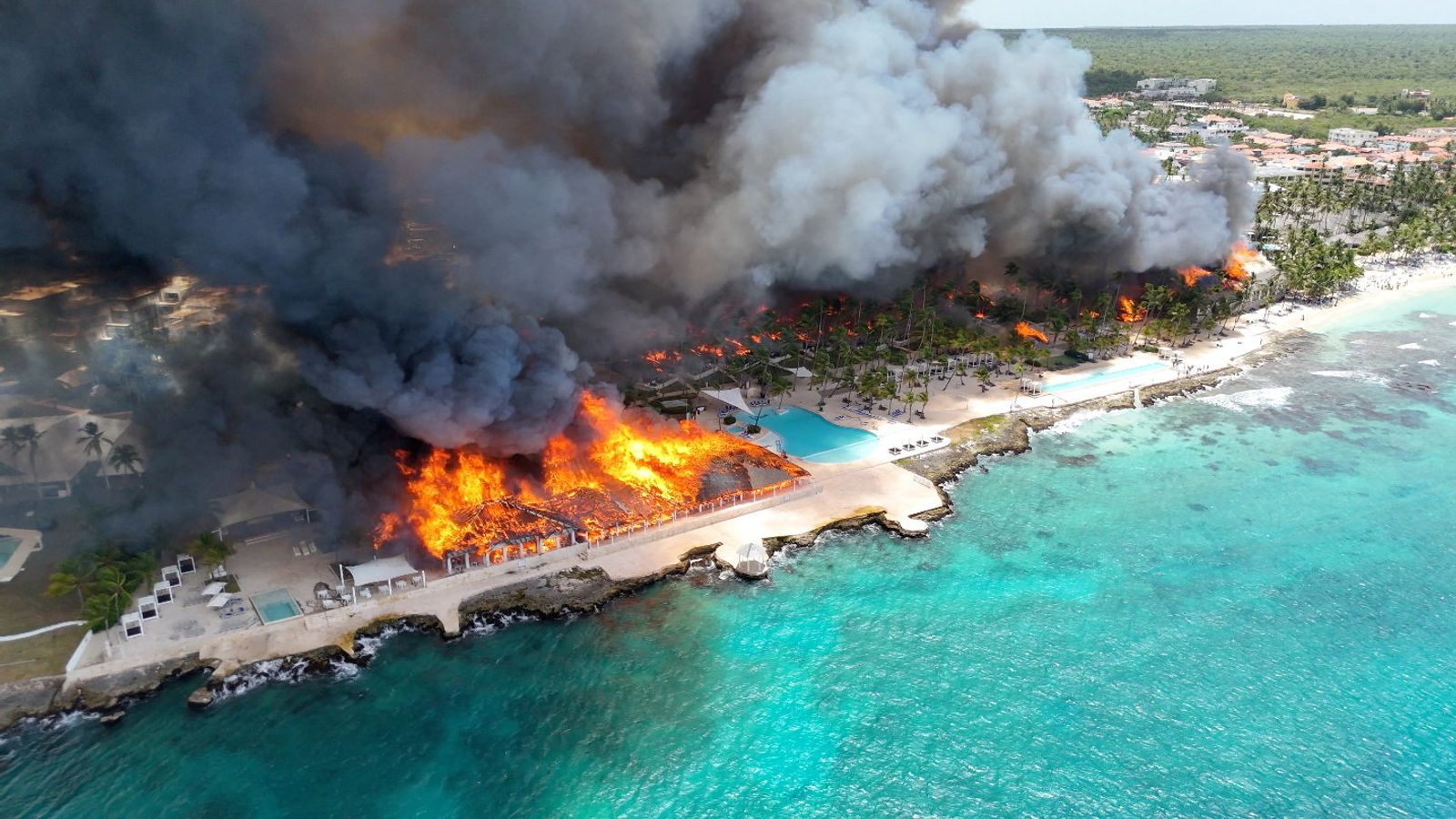 Tourist dies after huge fire destroys luxury beach resort