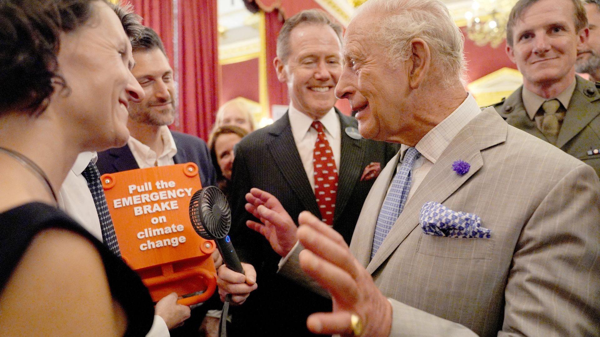 Charles joins climate reception on hottest June day on record