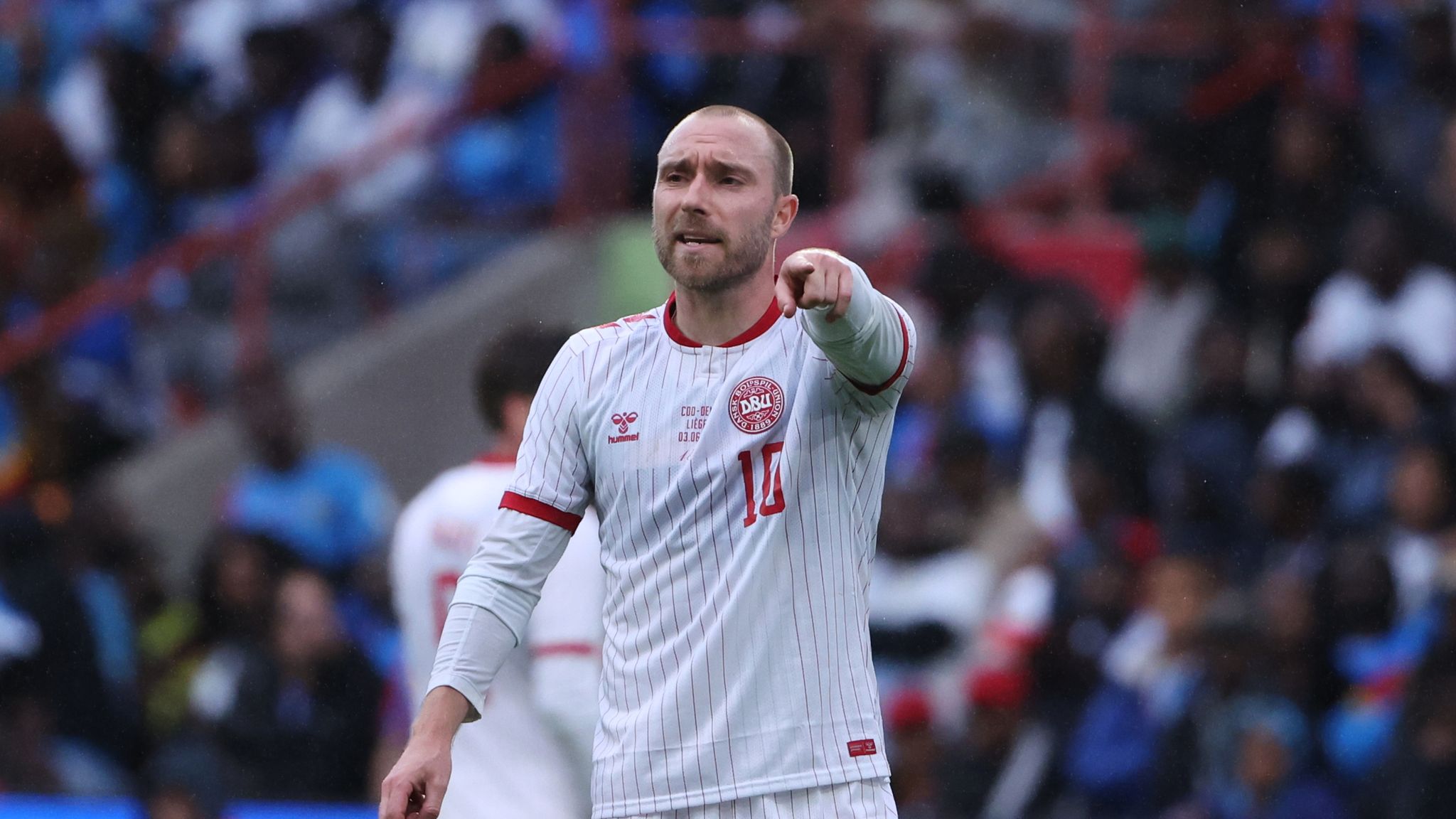 Denmark footballer Christian Eriksen collapses on pitch | World News | Sky News