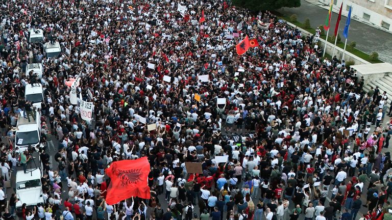 A drone view shows demonstrators gathering in Tirana. Pic: Reuters