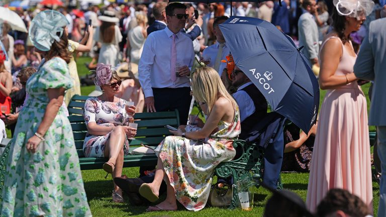 Racegoers in the hot weather on day four of Royal Ascot. Pic: PA