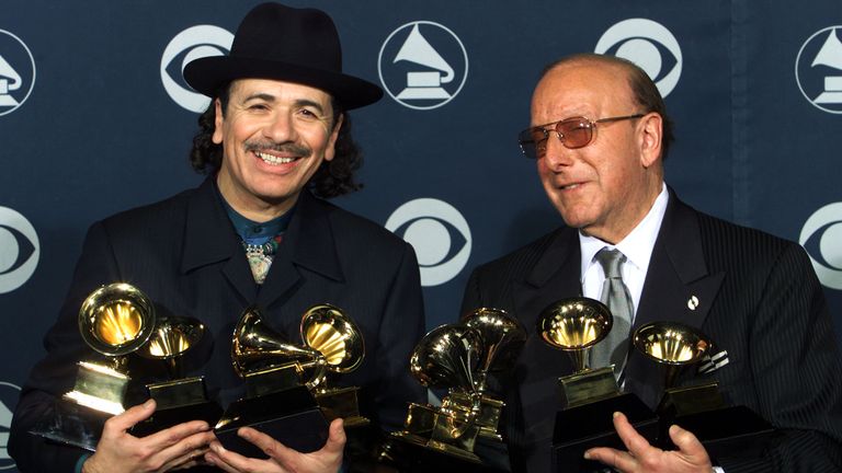 Carlos Santana and Clive Davis with the eight Grammy Awards Santana won at the 42nd annual Grammy. Pic: Reuters