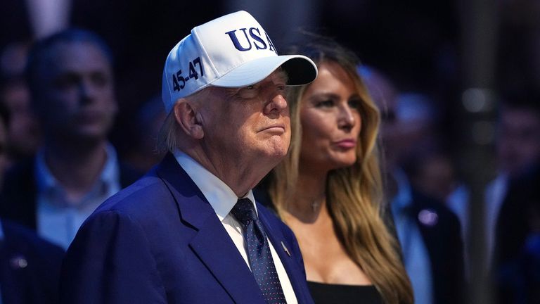 President Donald Trump, left, and first lady Melania Trump watch at the conclusion of UFC Freedom 250. Pic:AP