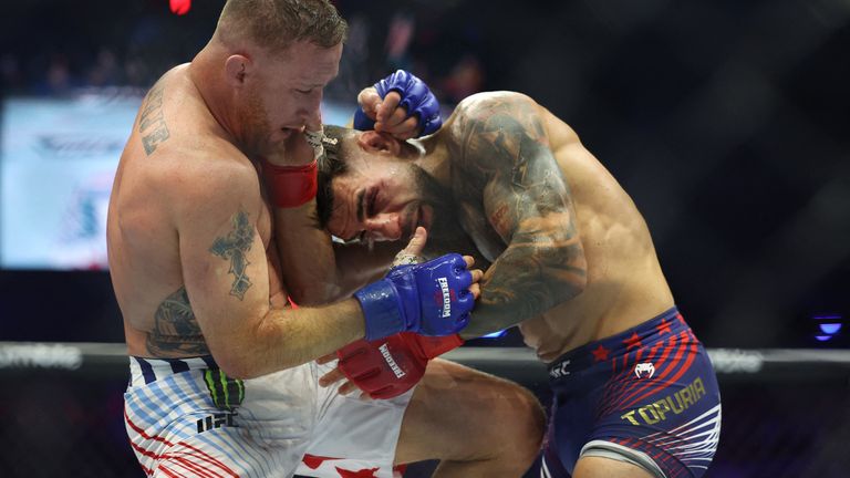 Justin Gaethje (left) stunned Ilia Topuria in the main event. Pic: Reuters