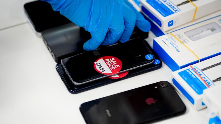 Police execute search warrants at shops suspected of handling stolen devices. File pic: PA