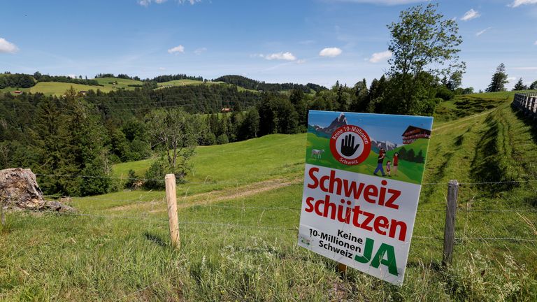 A sign sits in a field about the plan in Hundwil, Switzerland. Pic: Reuters