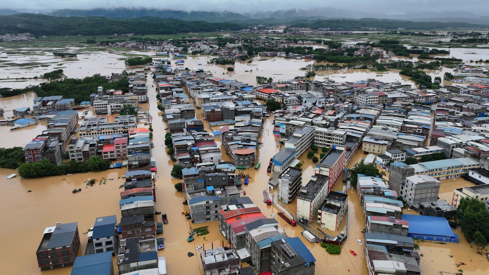China braces for super typhoon after severe flooding and thunderstorms leave multiple people dead