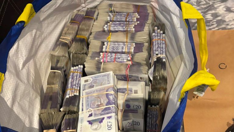 The cash was found across two bedrooms in Catford. Pic: Met Police 