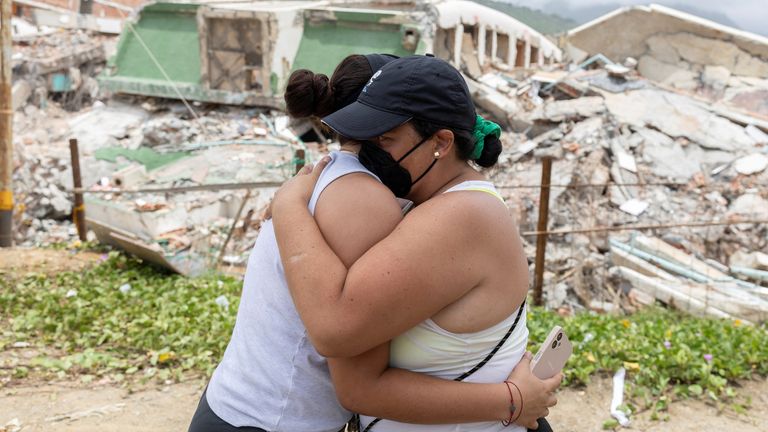 Maria Alejandra Sanz, 17, with her mother in La Guaira. Pic: Reuters