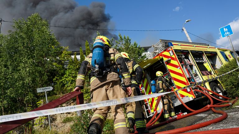 Firefighters are trying to bring the fire under control. Pic: Reuters