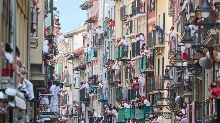 Balconies along the route of the bull run. Pic: AP