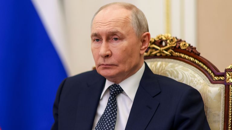 May's view on Putin's ambitions has not changed. Pic: AP
