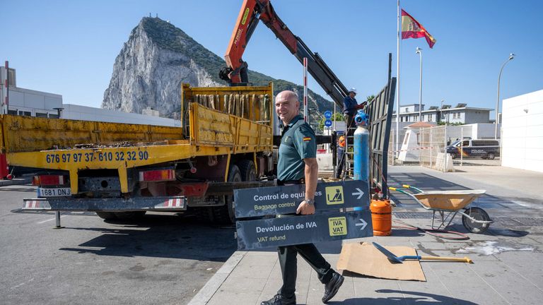 A Spanish Guardia Civil officer during the dismantling of the border checkpoint. Pic: AP