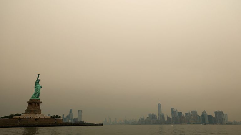 The New York City skyline seen through a cover of wildfire smoke. Pic: Reuters