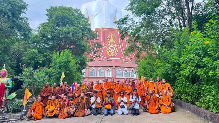 Thai Buddhist monks posing for a picture at Phu Manorom temple in Mukdahan province, on 2 July. Pic: AP