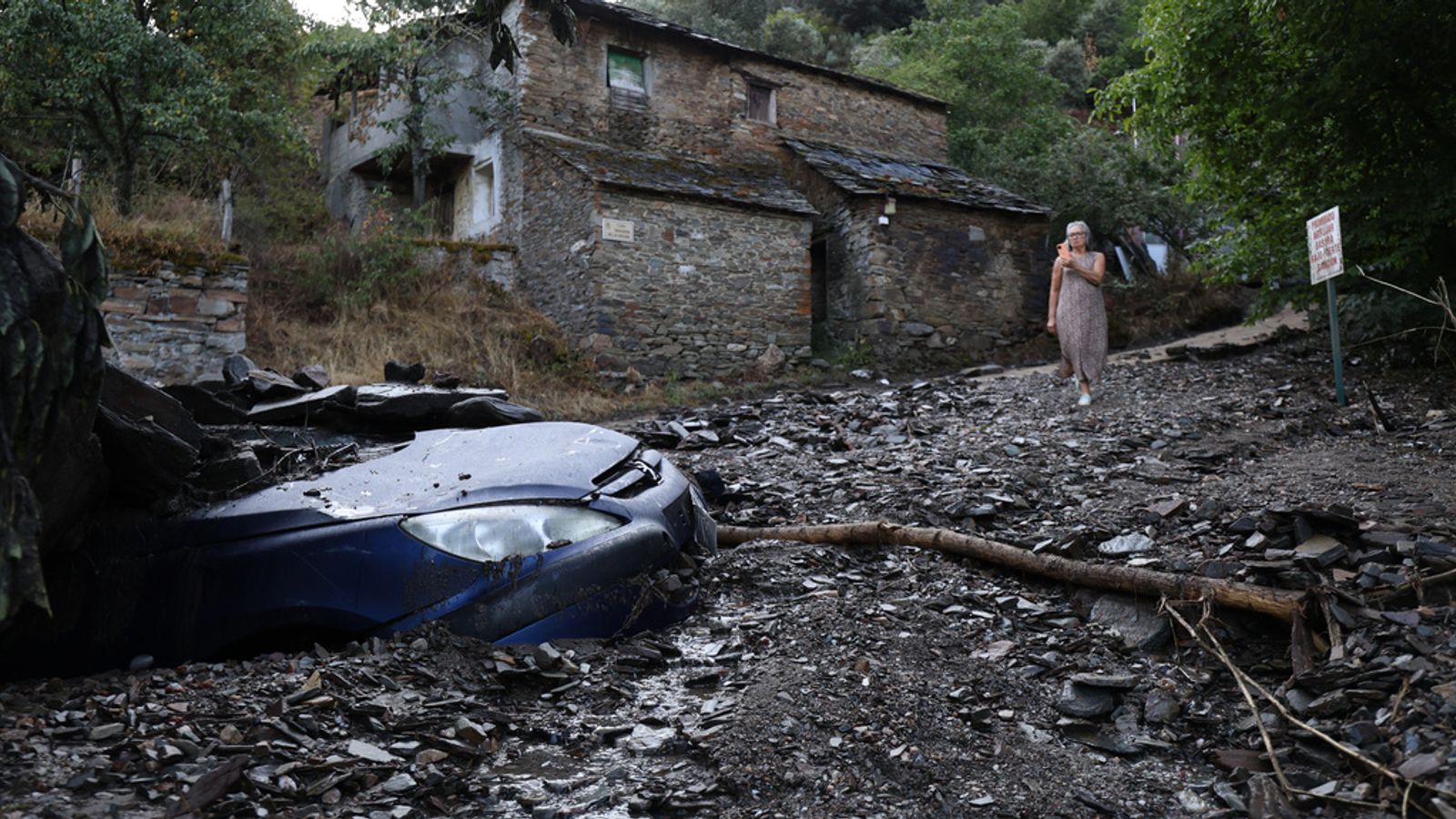 Hundreds flee as Belgium battles largest-ever wildfire at German border; two die in Spain mudslide as EU sends helicopters