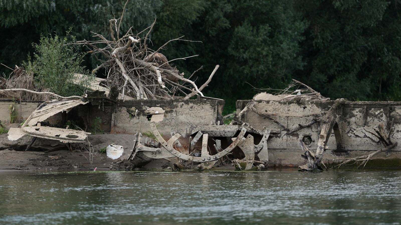 European drought reveals 100-year-old steam boat and ancient Roman bridge