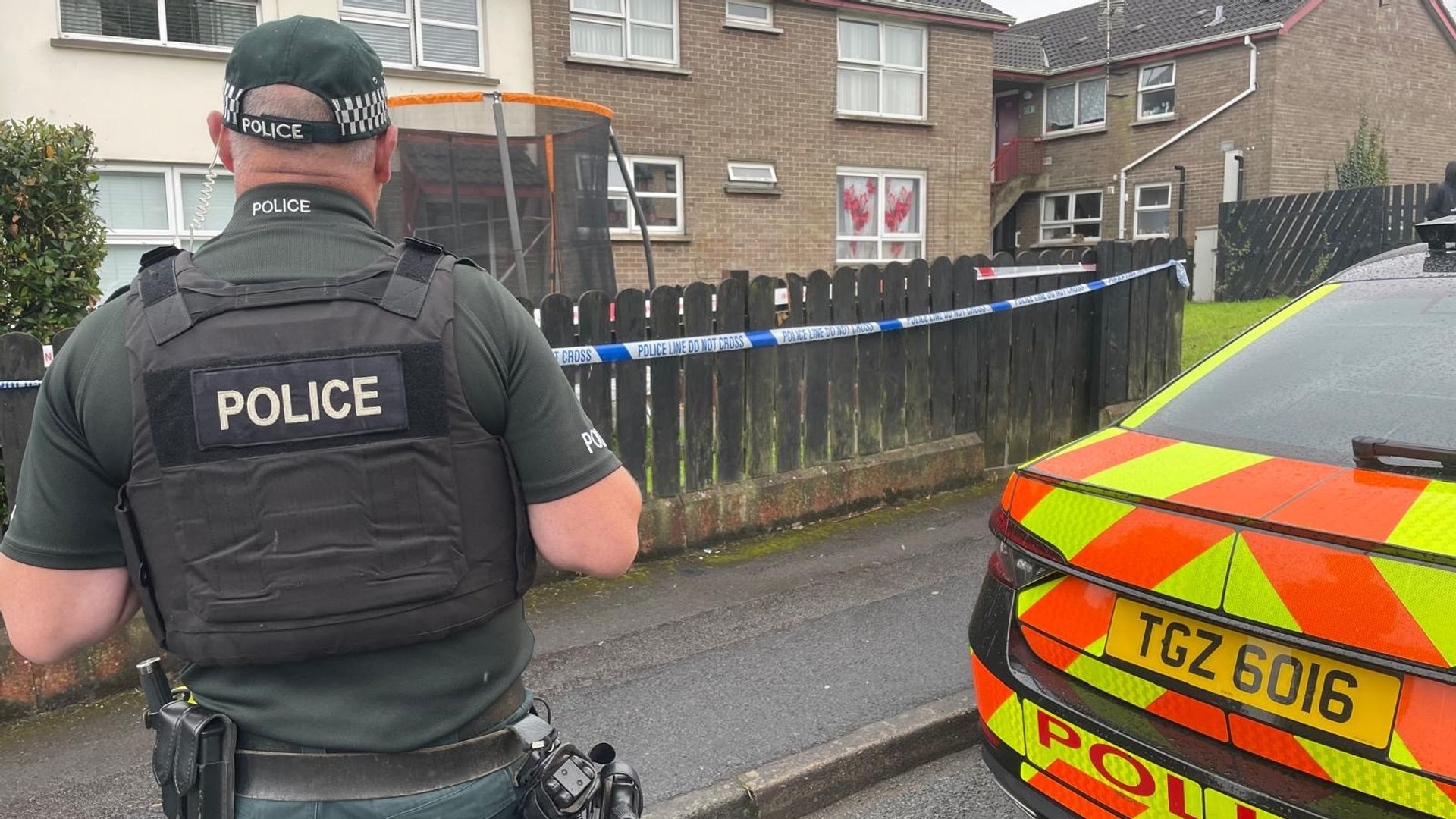 Murder arrest after man found dead next to seriously injured child