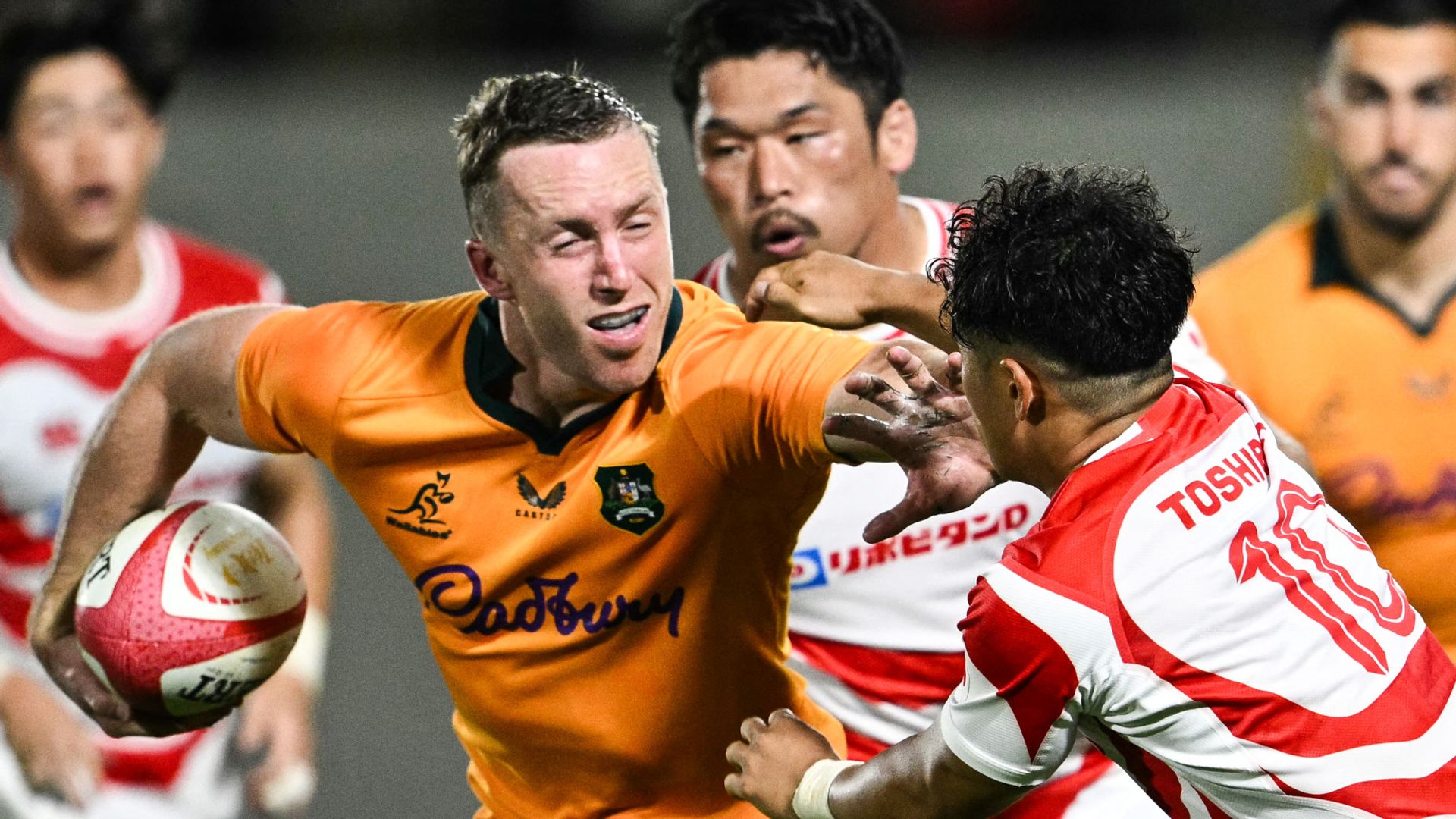 Australia survive late Japan rally as new coach Kiss makes winning start