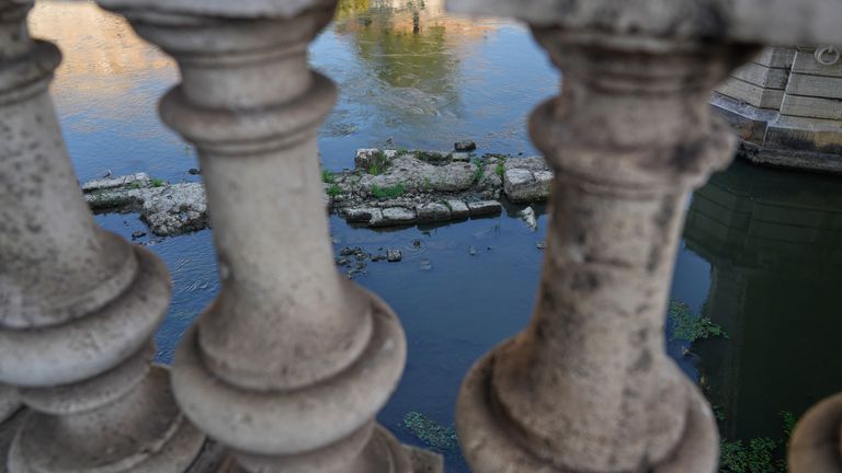 Ruins of an ancient Roman Neronian bridge emerges from the riverbed of the Tiber. Pics: AP