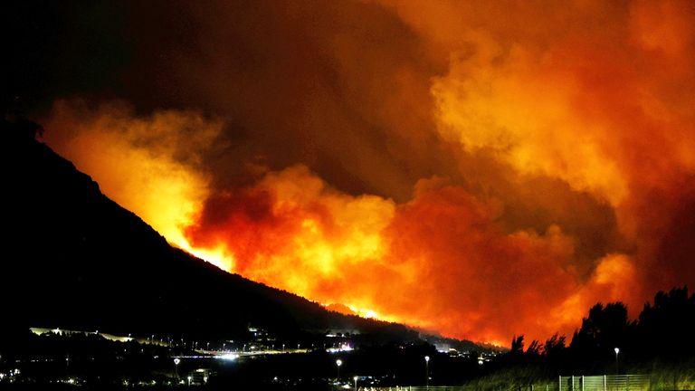 The sky burns red as a wildfire rages near Omis, southern Croatia. Pic: AP