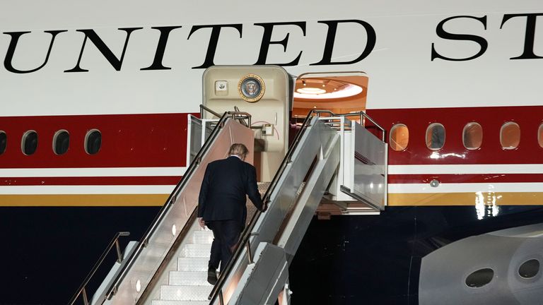 The US president boards the Qatari-donated Air Force One at RAF Mildenhall after flying from a NATO summit in Ankara. Pic: AP
