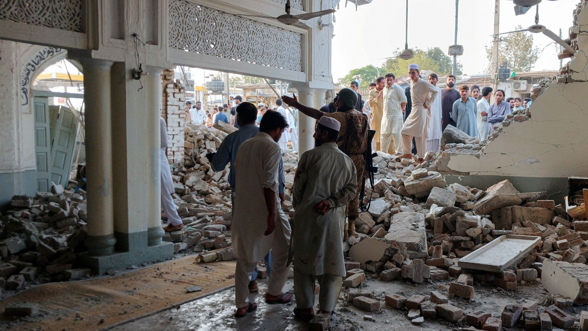 At least 16 killed in car bomb at mosque near police compound in Pakistan