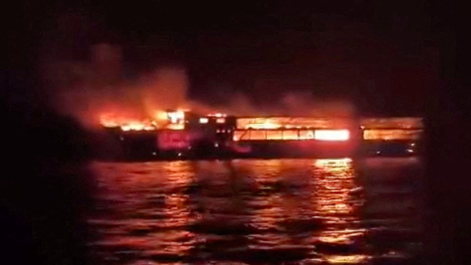 At least five dead and dozens missing after fire on Philippines ferry
