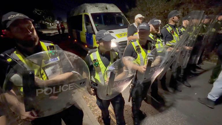 Police with shields during Portsmouth protest