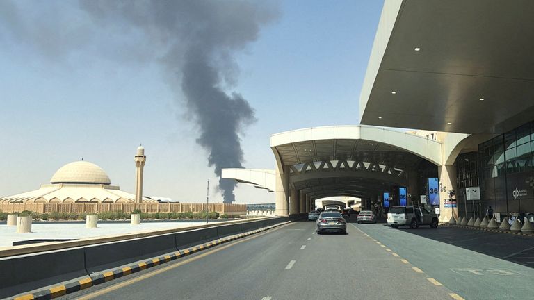 Smoke rises from the fuel storage area at Riyadh's King Khalid International Airport. Pic: Reuters