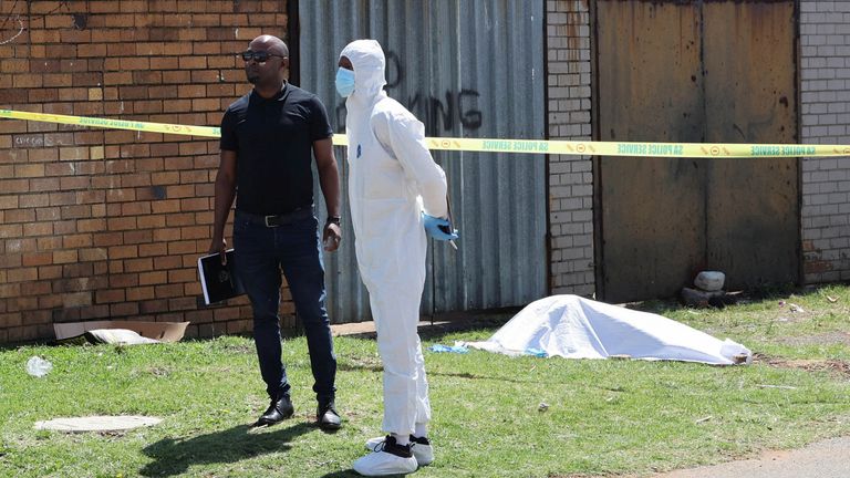 The cordoned-off crime scene where a seventh body was found. Pic: AP