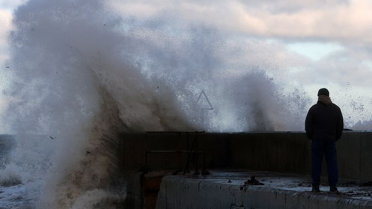 Storm Claudia reaches a pier in the coastal village of Cushendall, Northern Ireland on 14 November 2025. Pic: Reuters