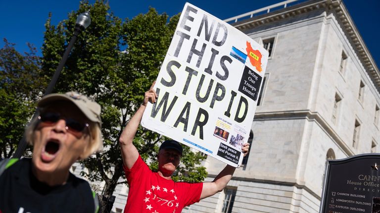 Protesters call for an end to the Iran war. Pic: AP